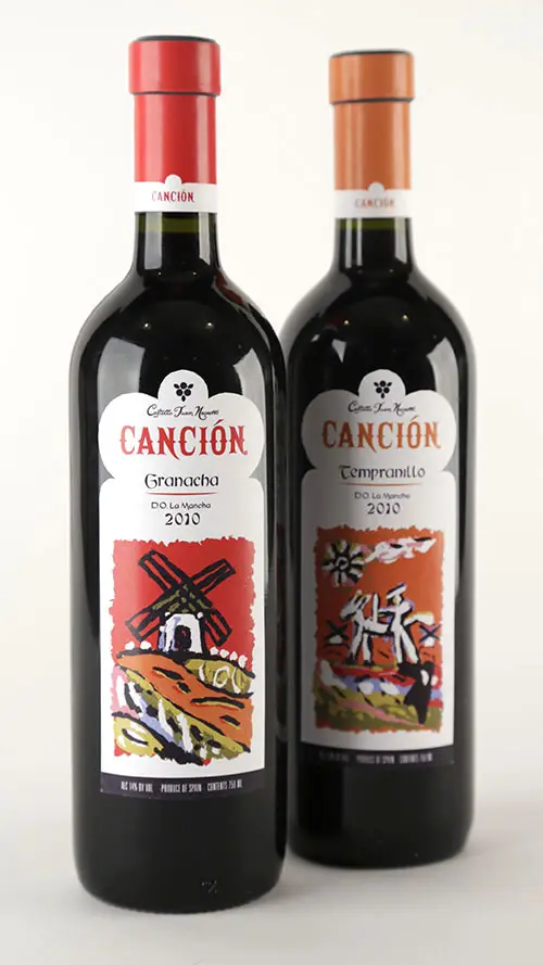 Final bottle designs for Castille Juan Navarro's wine Cancion, featuring colorful, modern paintings with imagery from the La Mancha region of Spain